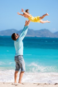 Father and daughter at beach